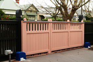 wooden gates with auto gate openers